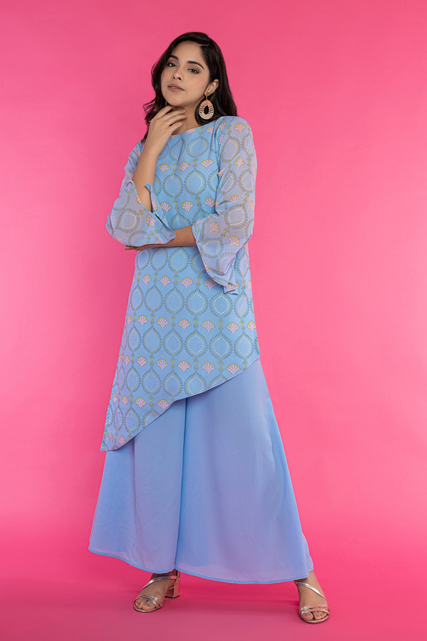 Powder blue printed diagonal hemline kurti and palazzo set