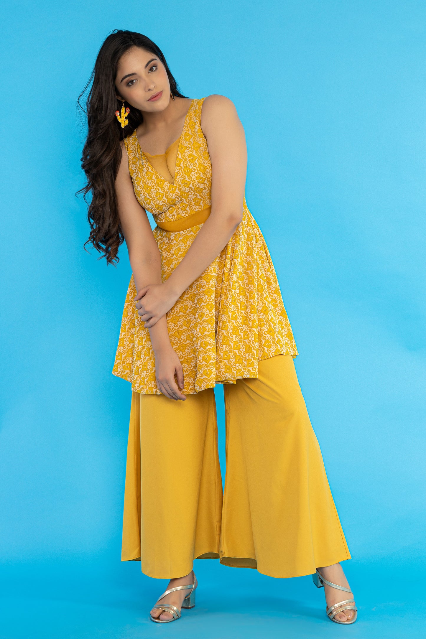 Yellow sleeveless peplum kurti set