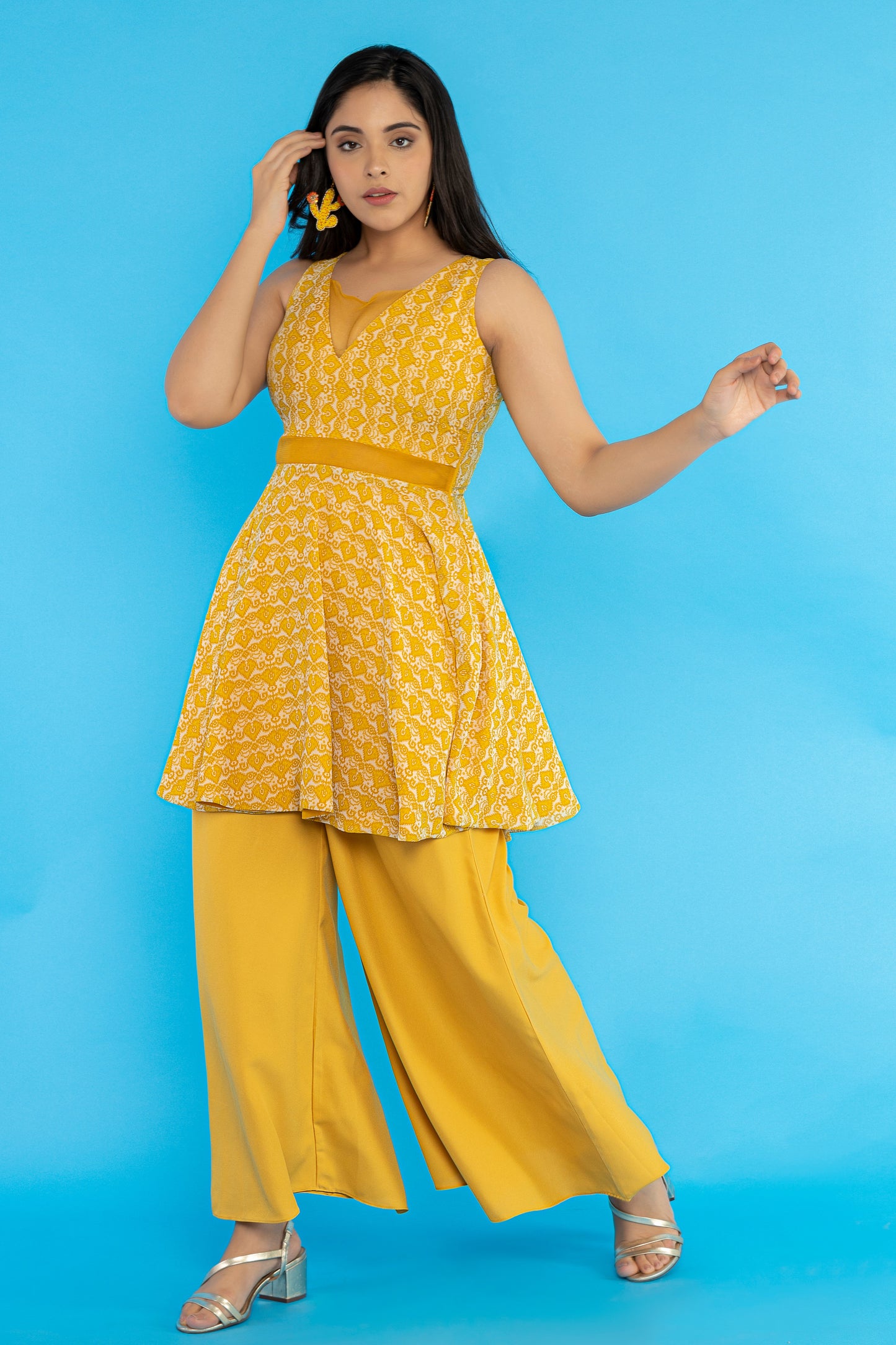 Yellow sleeveless peplum kurti set