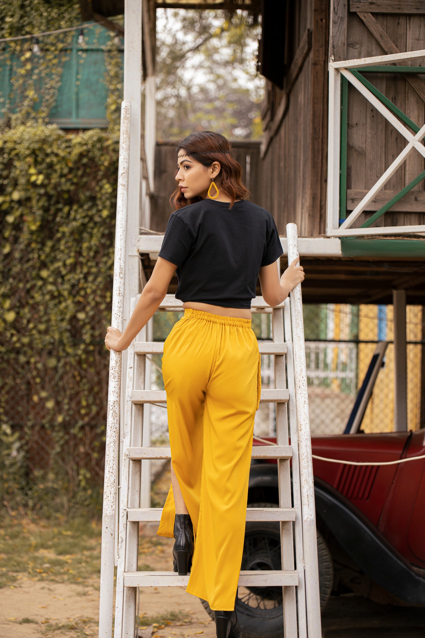 yellow slitted pants