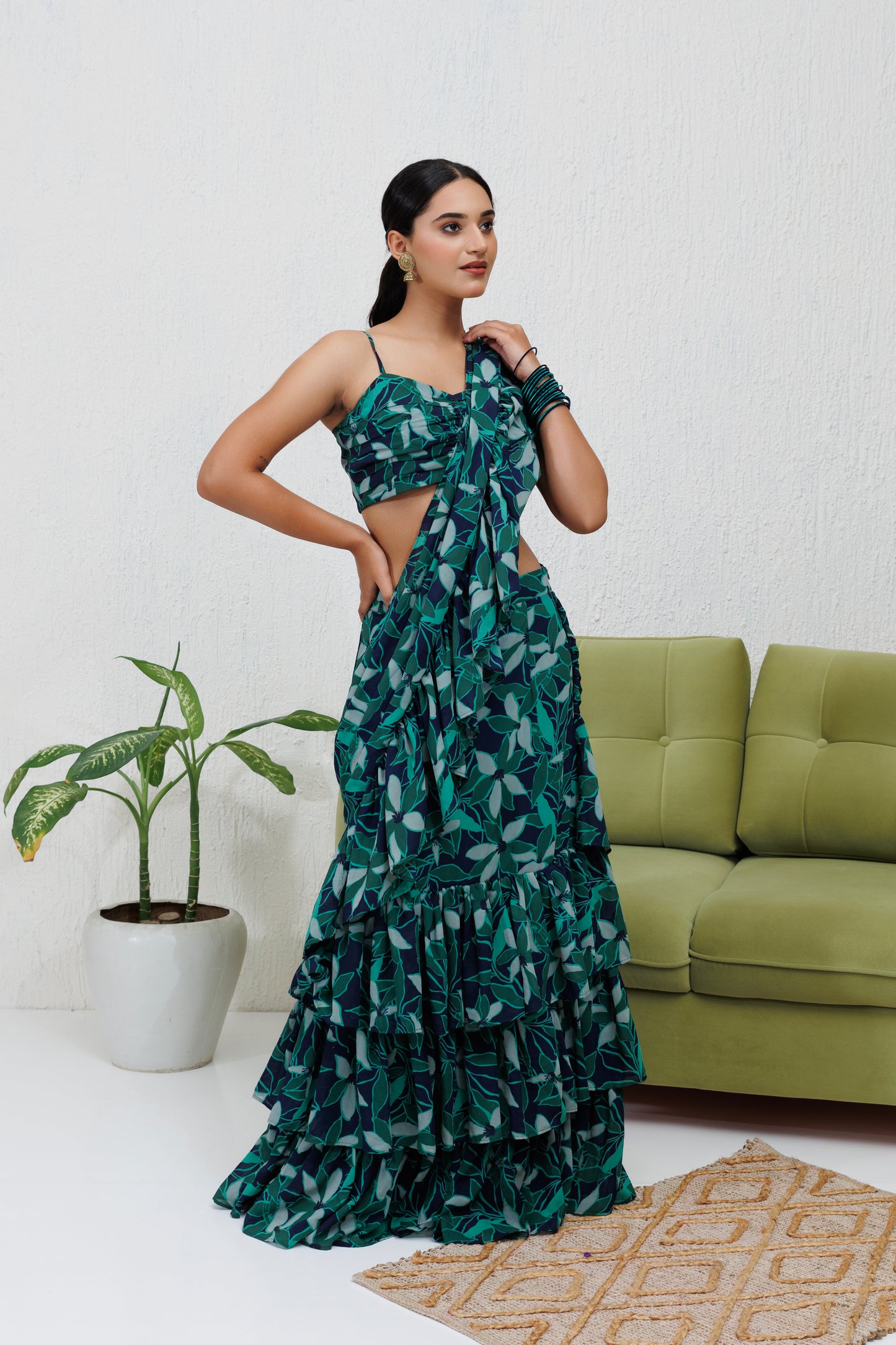 Mystique Melange: Green printed ruffle saree