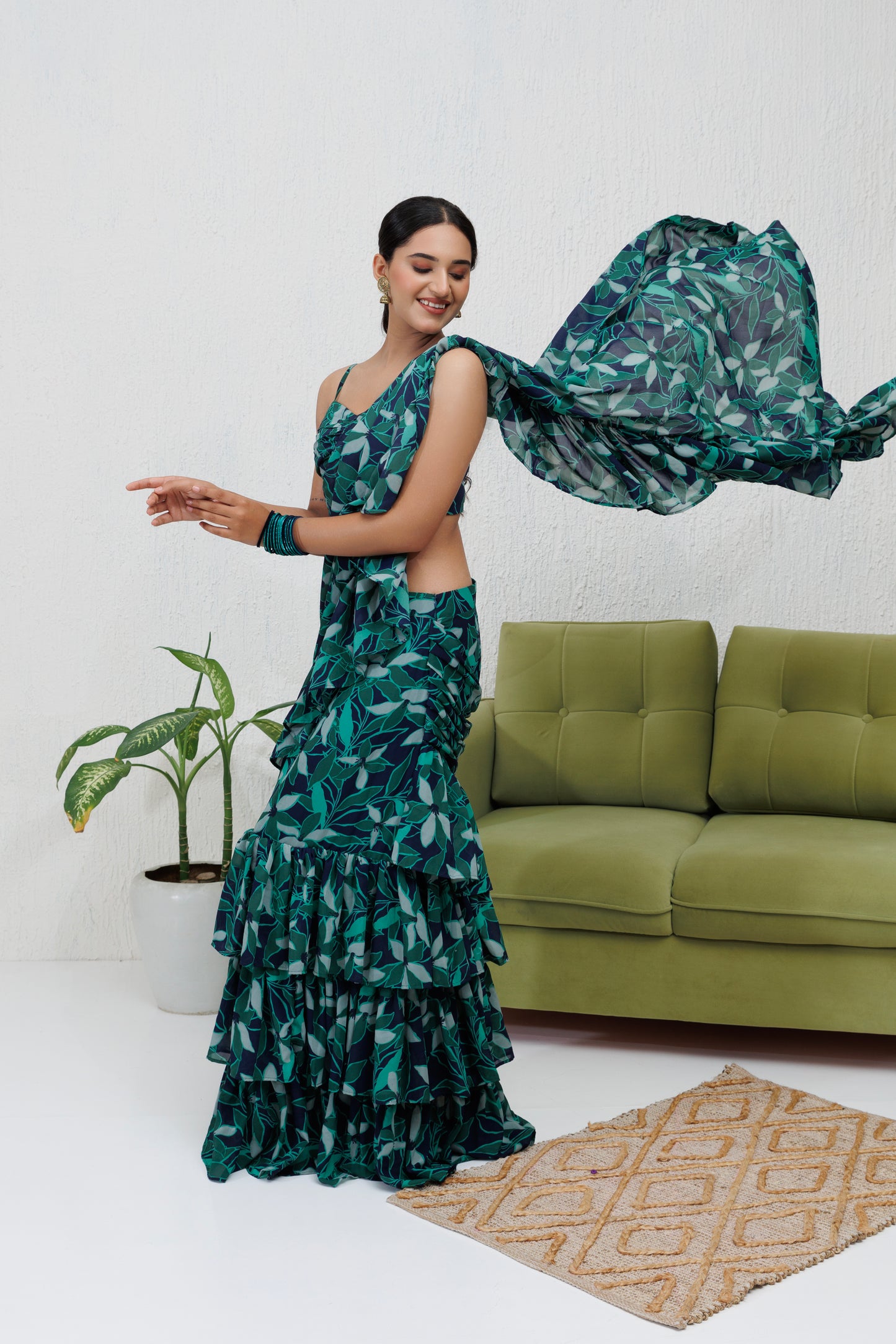Mystique Melange: Green printed ruffle saree