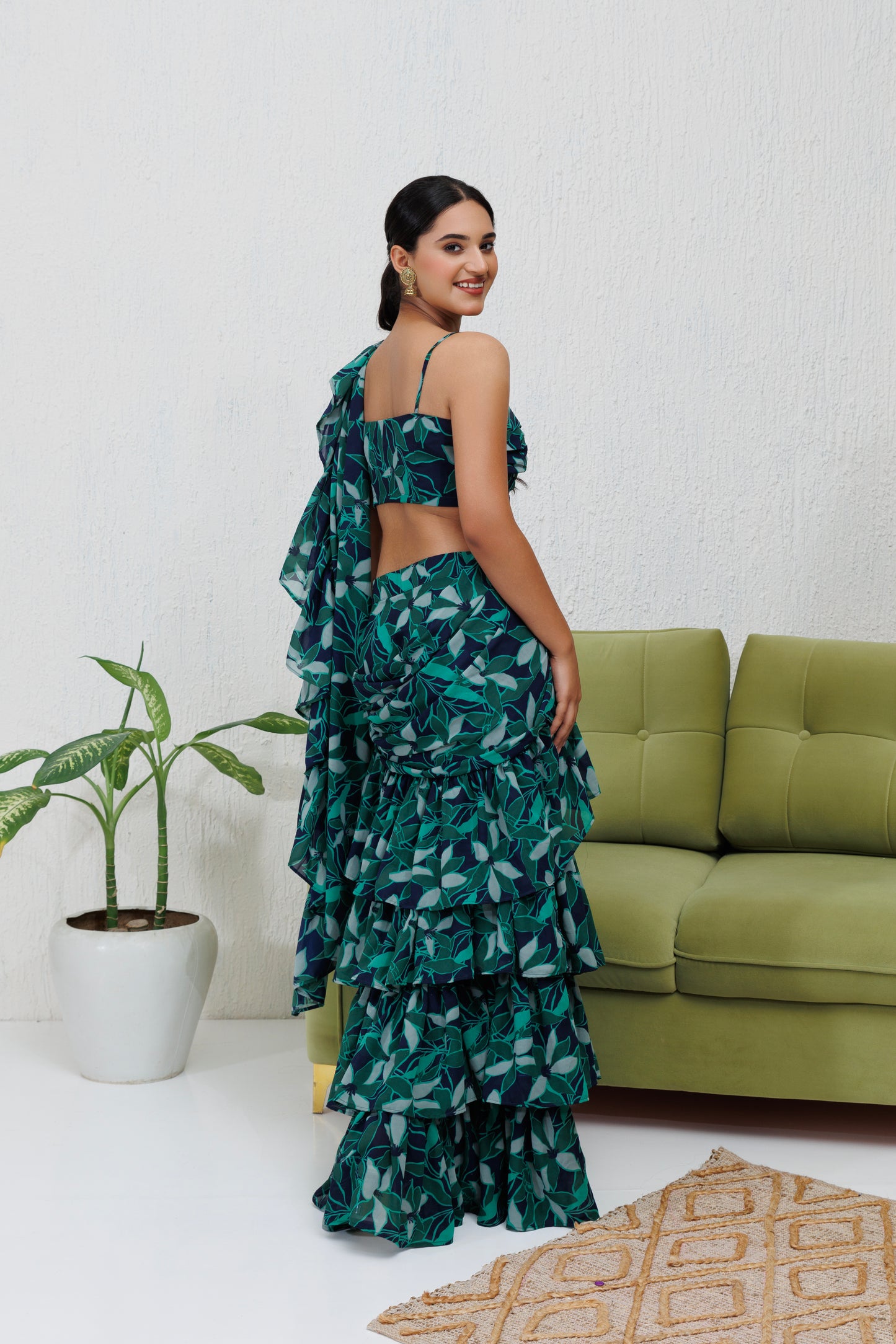 Mystique Melange: Green printed ruffle saree